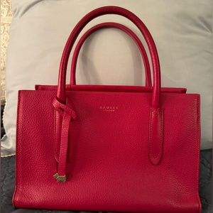 Stylish, roomy pink leather Radley purse